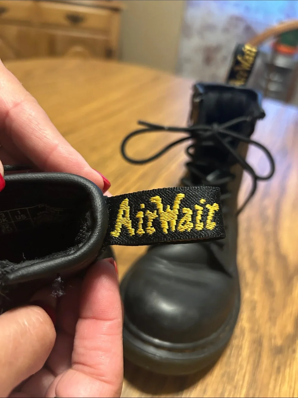 Dr. Martens Kids Black Lace-Up Ankle Boots with Yellow Heel Loop
